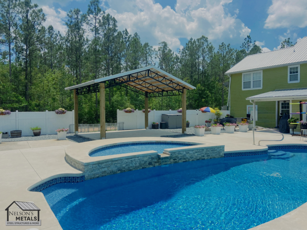 Inviting 20x20 pole barn serving as a poolside cabana.